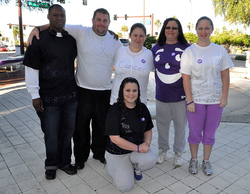 Tony Humphrey, Chris Cook, Krystal Kahn, Kathy Reinbolt, Mariah Kahn and Kayla Kahn, sitting in front, walk each year in honor of Michael Kahn who passed away in 2006.