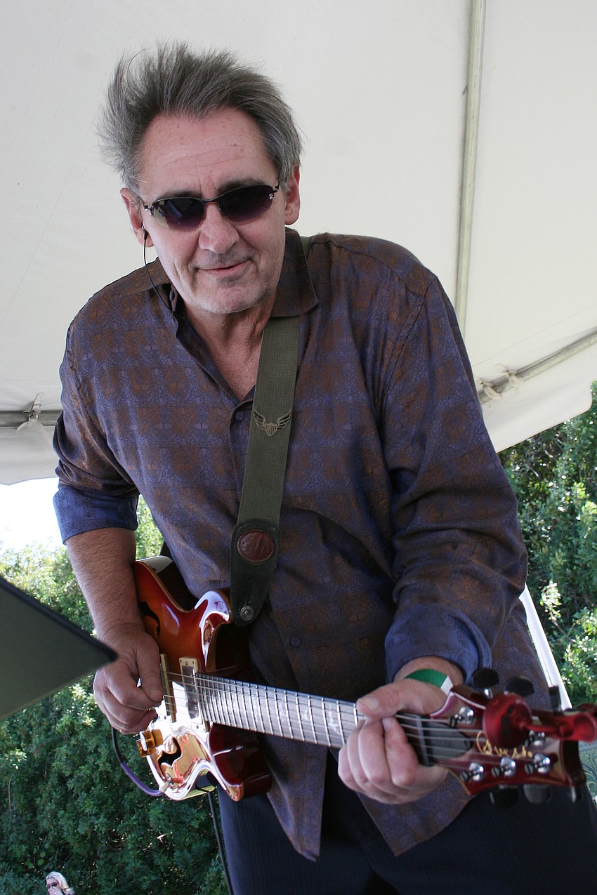 Guitarist Greg Poulos wowed the crowd with his tasteful solos.