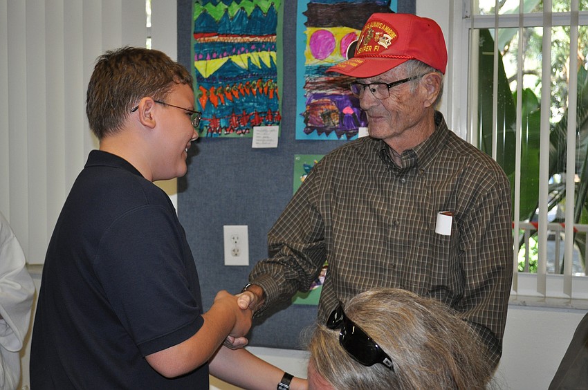 Dalton Kindt presenting to Richard Fuller