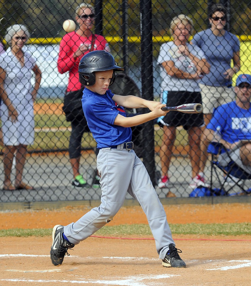 Seven-year-old Logan Grace notched a hit early in the game for the Cubs.