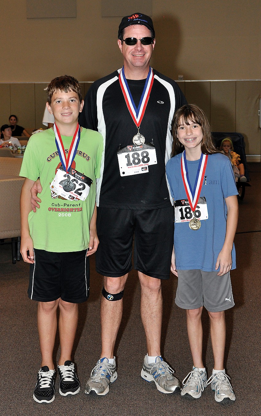 Members of the Hoskinson family all won medals â€” No. 262 Nick Hoskinson, No. 188 George Hoskinson and No.186 Katie Hoskinson.