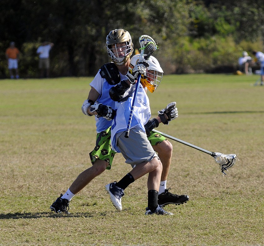 The Out-of-Door Academy ninth-grader Adam Scalisi looks to get around a defender.