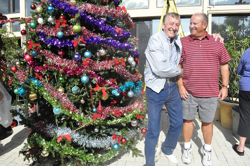 Manager D.M. Williams and President John Zefeldt get on the same level