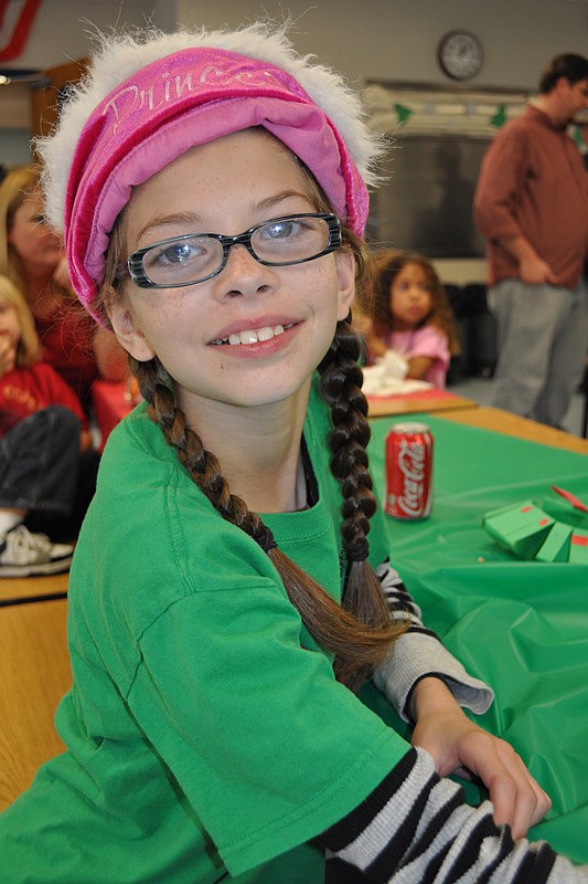 Felicity Anderson, 11, watched her sister, Sean, sing in the choir.