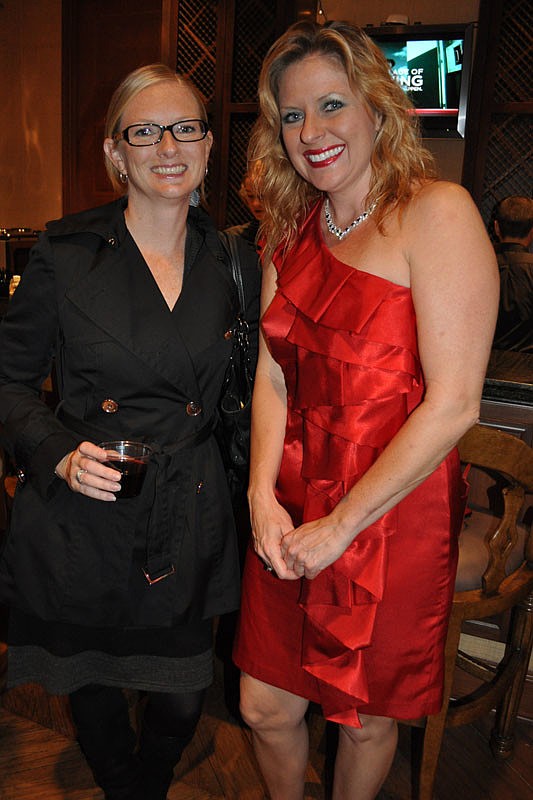 Jodi Egger of TideMark Financial with Lorii Weile of Environmental Biotech