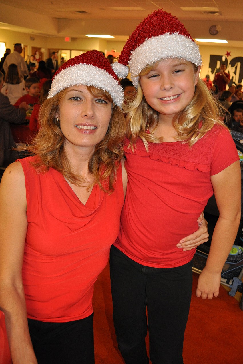 Tanya and Sasha Krill both wore their Santa hats.