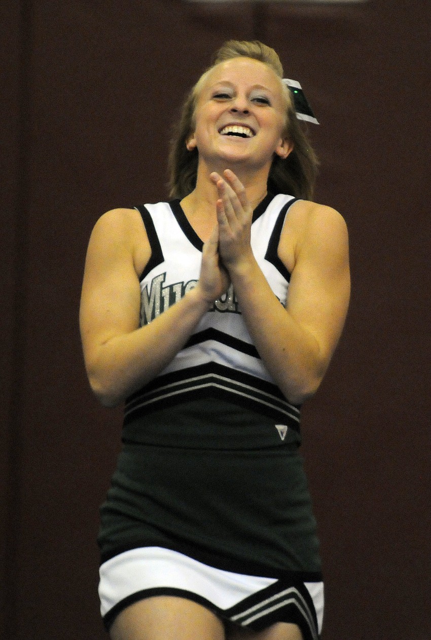Senior Hannah Asay is enjoying her final season cheering for the Mustangs.