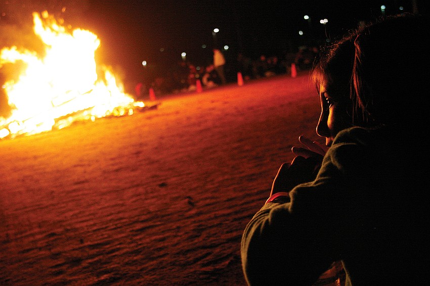Ari Siegel, 7, snagged a front-row seat by the fire during Freedom Elementary School's Bonfire Feb. 11. Published Feb. 17, 2011.