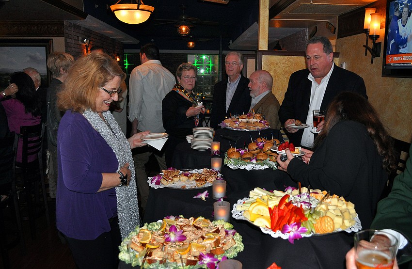 Those who attended the holiday party for the DSA enjoyed a buffer style of appetizers at the Irish Pub on Main.