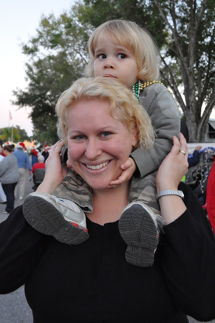 Nikki Schuster and her son, Benjamin, enjoyed the parade with their family.