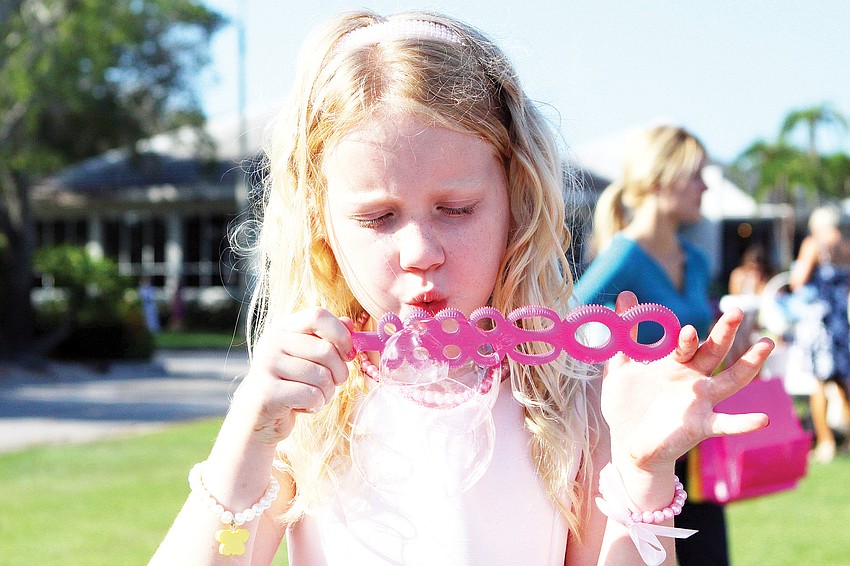 Tatum Blair blew bubbles in April during the Longboat Key Clubâ€™s Easter egg hunt.