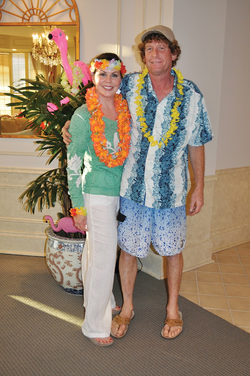Christa Kilgore and Alan King donned festive Hawaiian wear for the Promenadeâ€™s welcome-back luau in November.