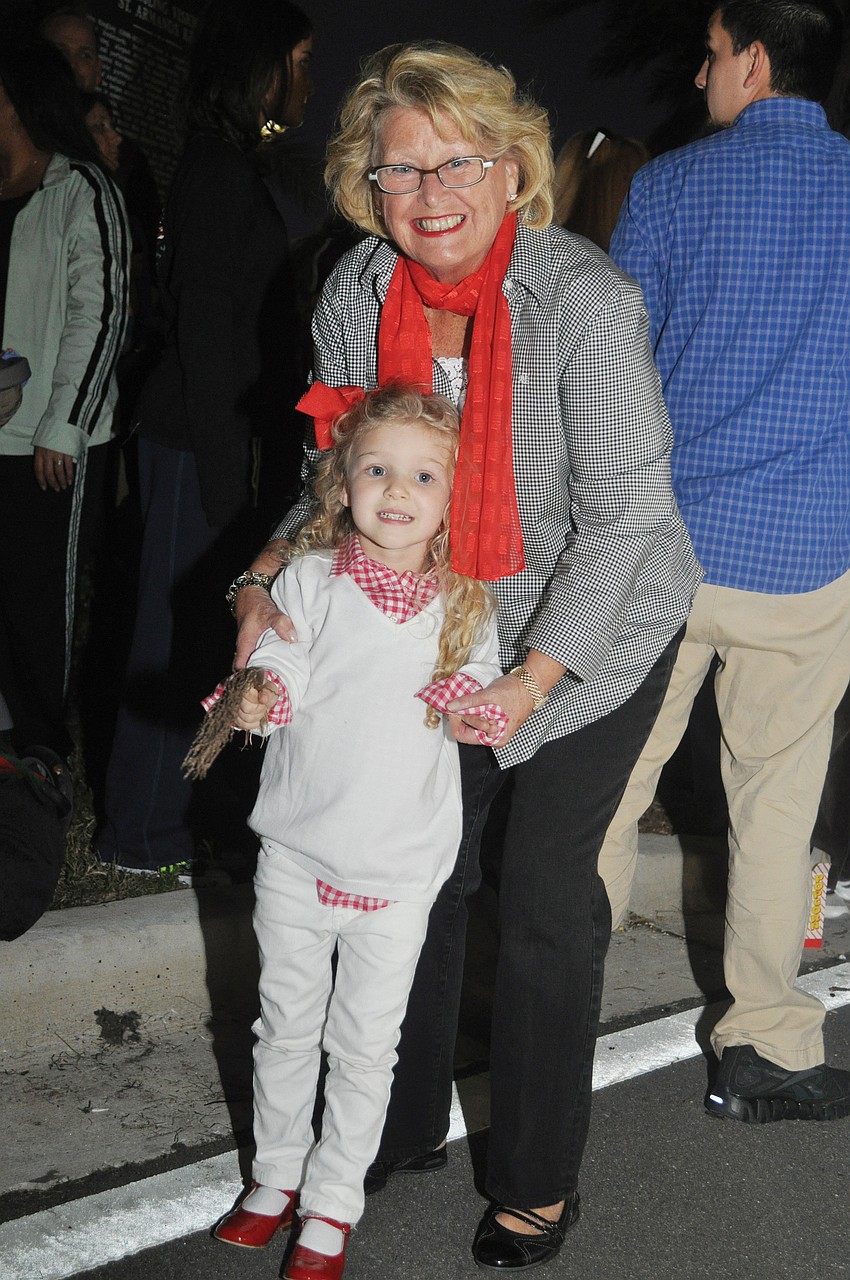 Madison Dworet and her grandmother, Bette Recupero, eagerly await the arrival of Santa in December at the Holiday Night of Lights event on St. Armands Circle.