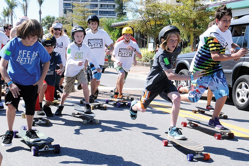Eleven-year-old Bayou Bowman pulled out in front to win the 12-Year-Old and Under division of a longboarding competition held March 13 on Ocean Boulevard.