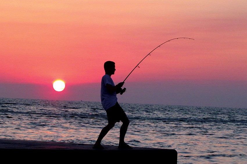 FISH TALE: Lucy Fox photographed Matthew Fox catching a snook on Fatherâ€™s Day.