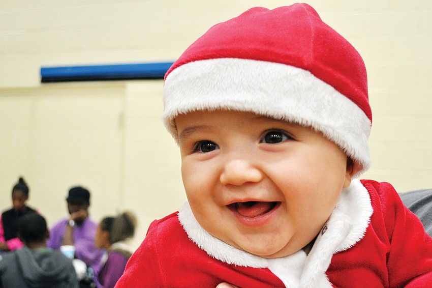 Cole Miller, 7 months, was dressed in his own Santa suit in December during Healthy Families Sarasotaâ€™s Holiday Party at FirstBaptist Sarasotaâ€™s Family Life Center.