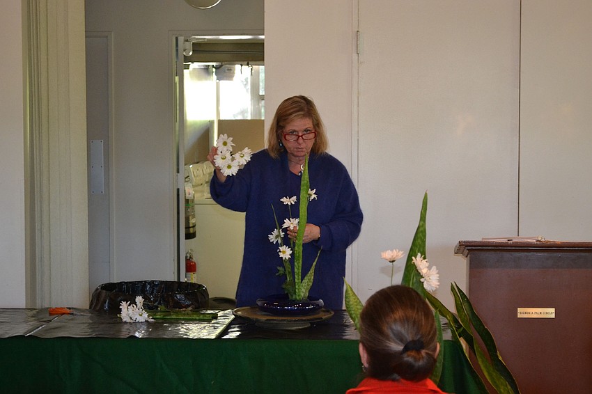 Janice Hamlin taught the first of the six lectures on floral arrangement.