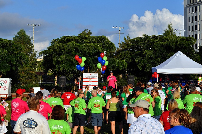 The crowd of over 1,600 gathered around to listen to people talk about the cause and the walk during the Sarasota/Manatee Heart Walk Saturday, Sept. 24, at Payne Park.