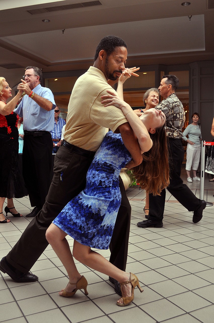 Tony Holliman dips Allison Palm during a dance Sunday, Sept. 25, at Westfield Southgate.