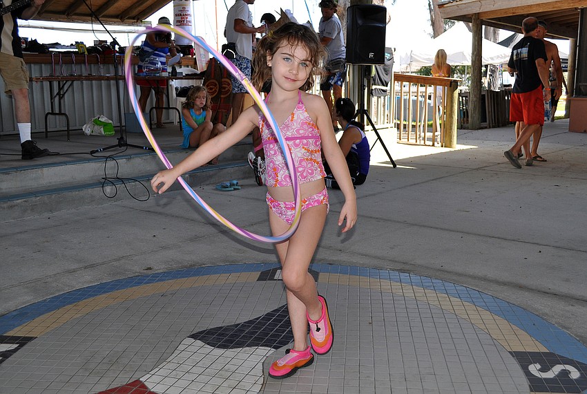 Jaycee Morrison, 6, has fun with her hula hoop.