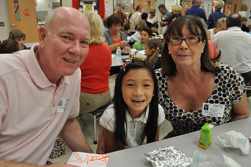 Joe and Linda Sandor ate with their granddaughter, Julia Felice, center.