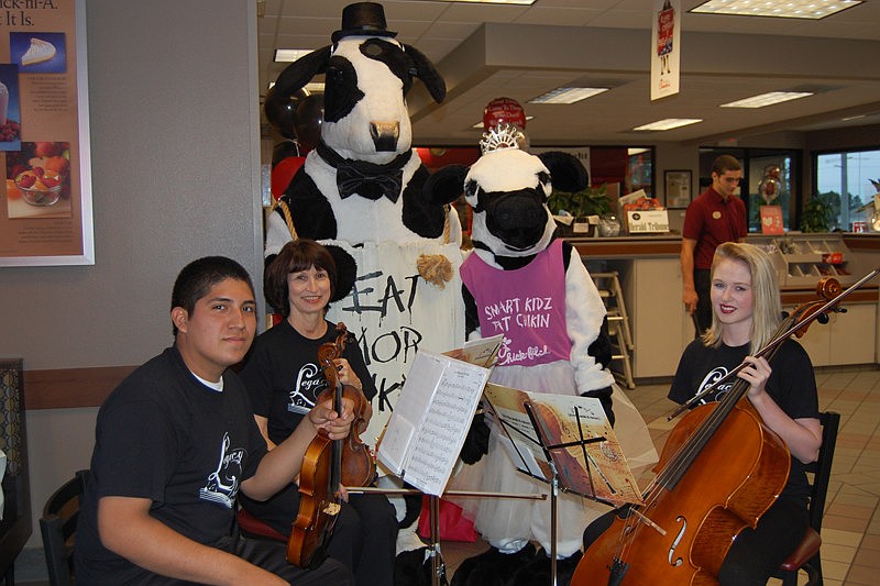 Teacher Kathy Cook and members of the Braden River High School Orchestra added a special touch to the evening with live music.
