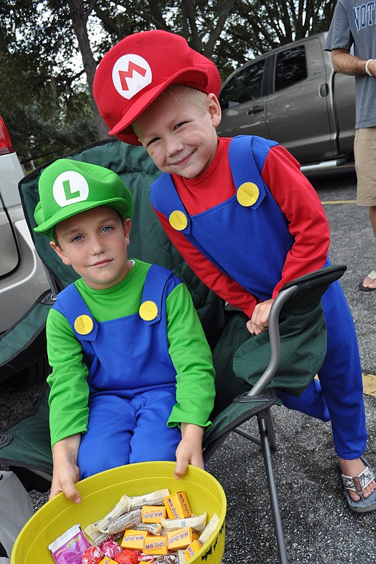 Mason Wright and his friend Kaden Tribble passed out candy during a trunk-or-treat.