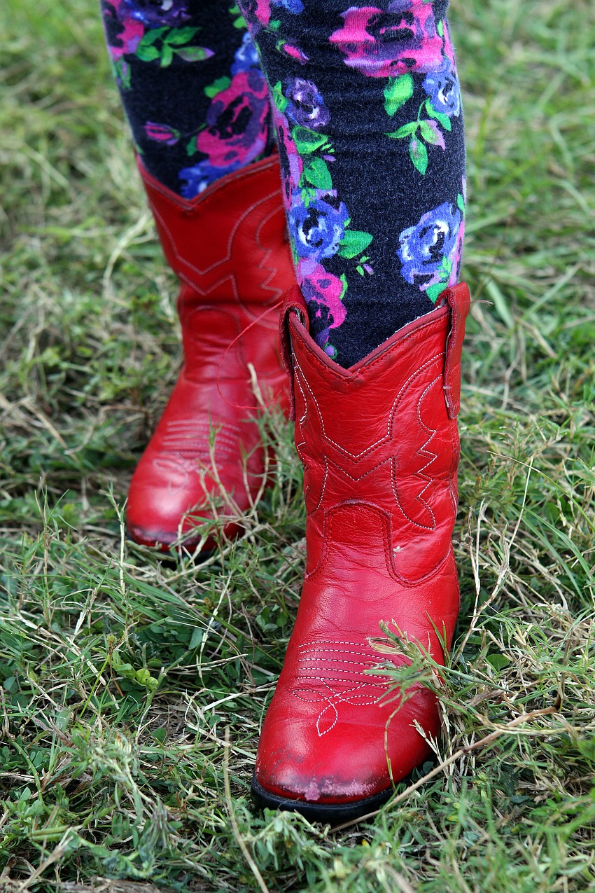 Mia Anderson, 4 1/2, wore her red boots to the 21st annual Sarasota Blues Fest, Saturday, Nov. 5, out by Ed Smith Stadium.