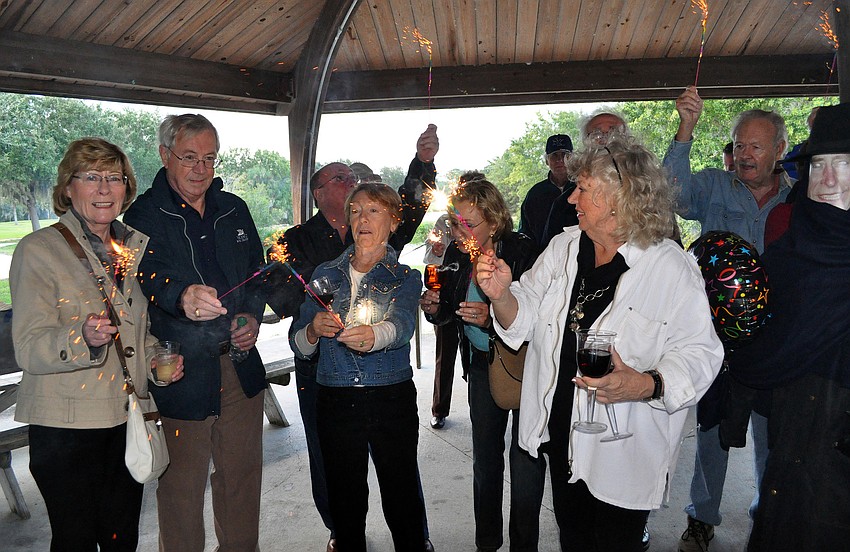 Members of the Sarasota British Club light up their sparklers as part of their Guy Fawkes celebration, Saturday, Nov. 5, at Twin Lakes Park.