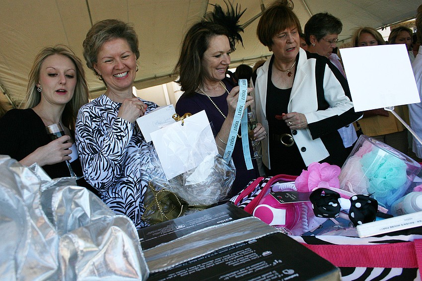 Guests perused the raffle items during the event's cocktail hour.
