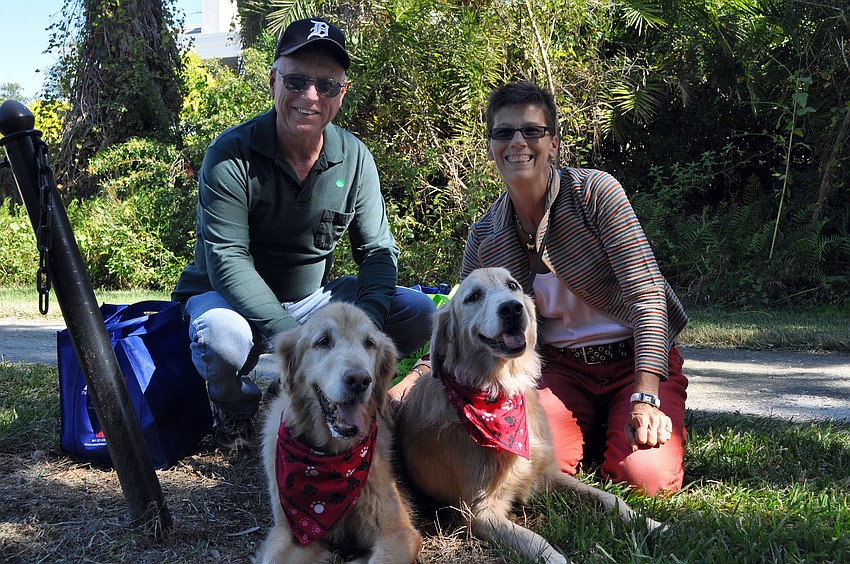 Mike and Kim Ackerman pose with Trooper, 12, and Keelie, 5.