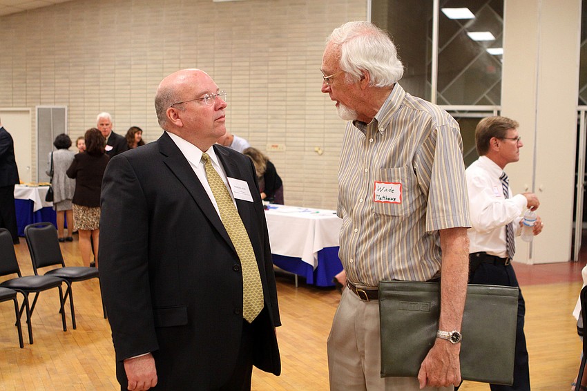 Randall Reid talks with Wade Matthews.