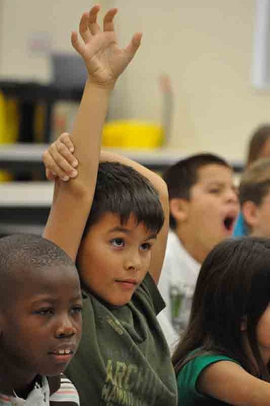 Micah Redfield, center, had plenty of questions for the veterans.