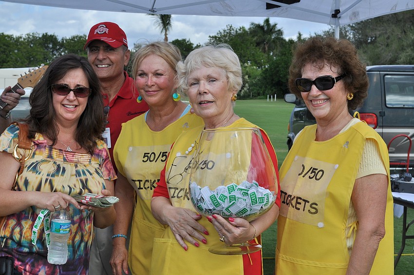 Leah Lutz won $1,500 in the raffle. With her are John Saputo, Sylvia Babineau, Norah Browne and Gosette Whiteneck.