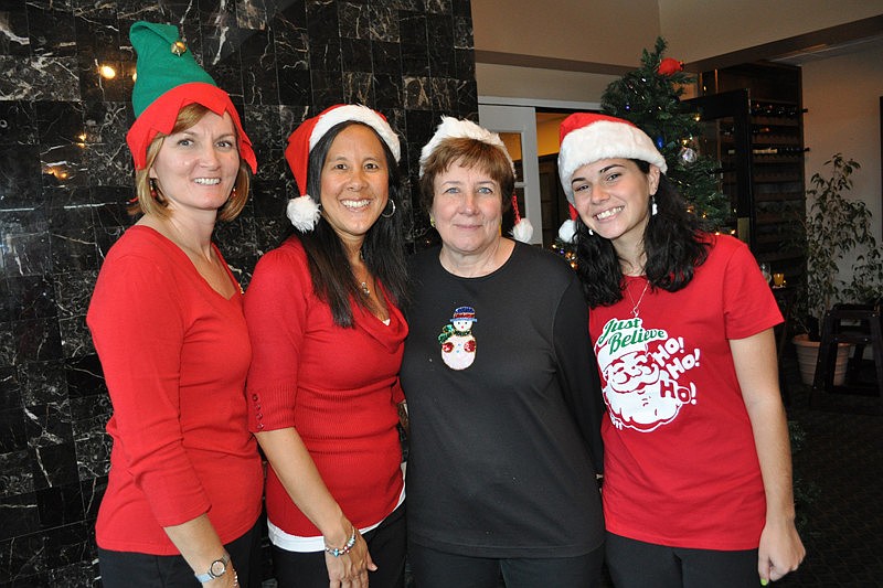 Karen Droz, Dianne Wudte, Lynda Hart and Ashley Carraway served as Santa's helpers.