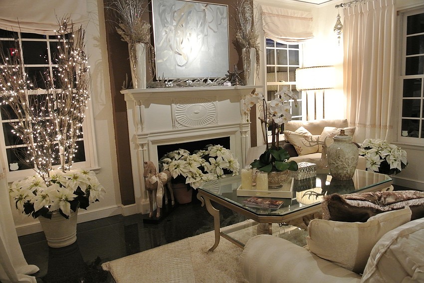The parlor features neutral decor and was designed by Micheline LaBerge.
