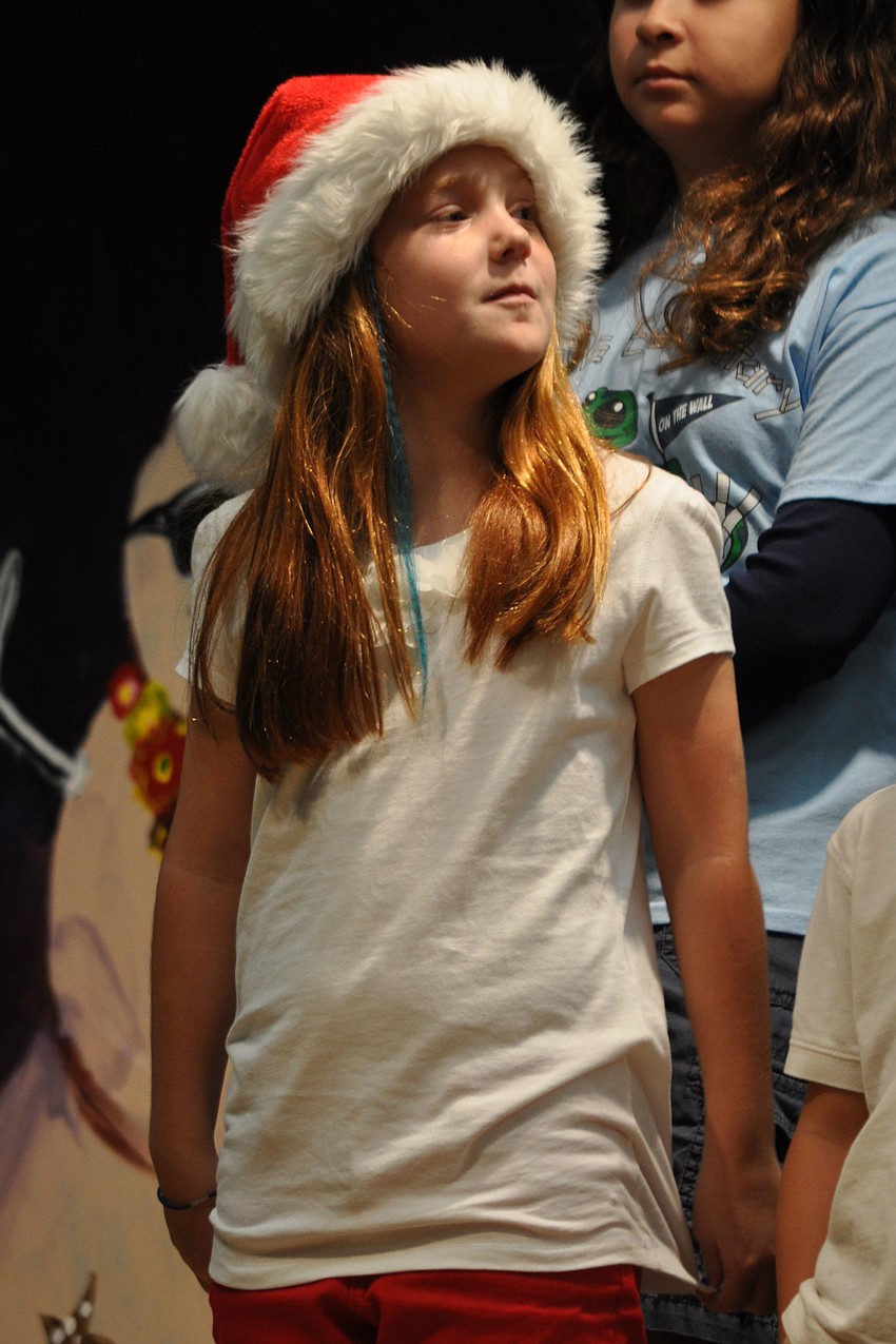 Mae Quinn proudly donned her Santa hat.