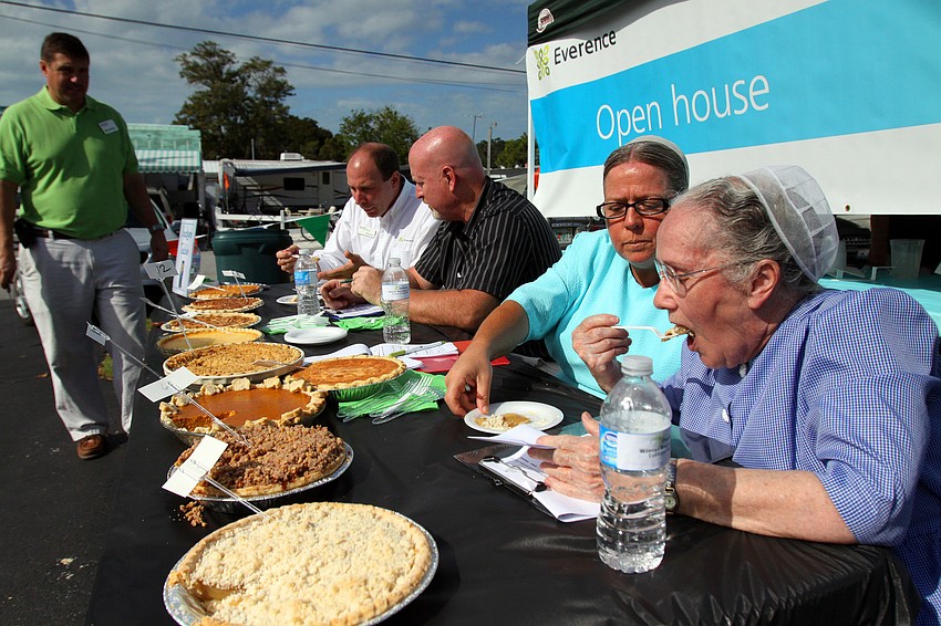 The four judges had to taste and judge 21 different pies during the 1st annual pie contest, Friday, Dec. 9 at Everence Federal Credit Union.