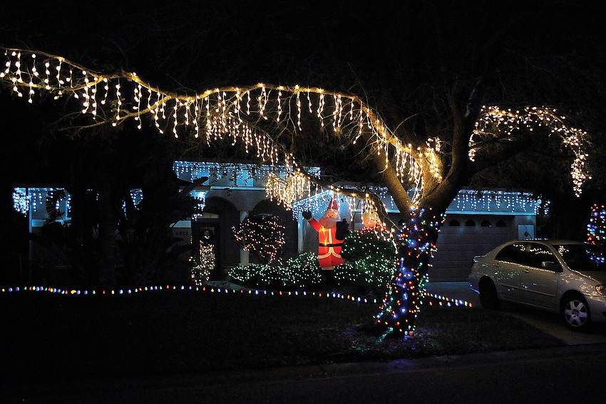 This light display on this home on Fox Grape Lane in Summerfield features beautiful icicles on the tree.