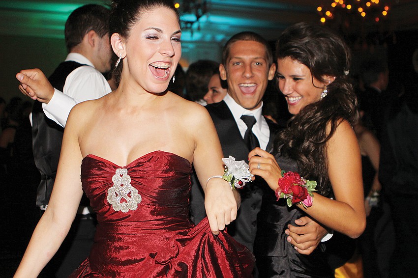 Katie Steiner, John Giba and Sarah Morin hit the dance floor at Riverview High Schoolâ€™s prom in April.