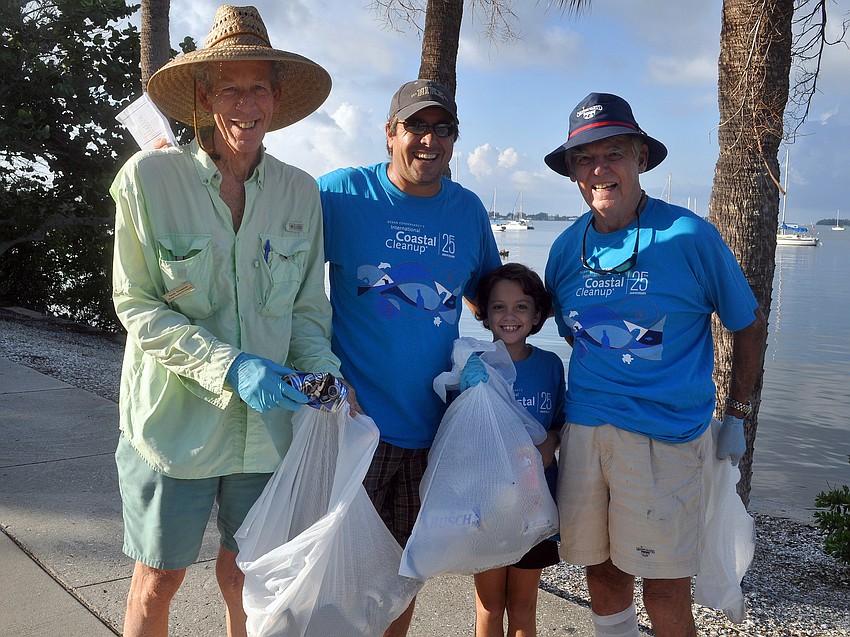 Randy Schweitzer, Roger Piro, Caitlin Piro, 9, and John Ross