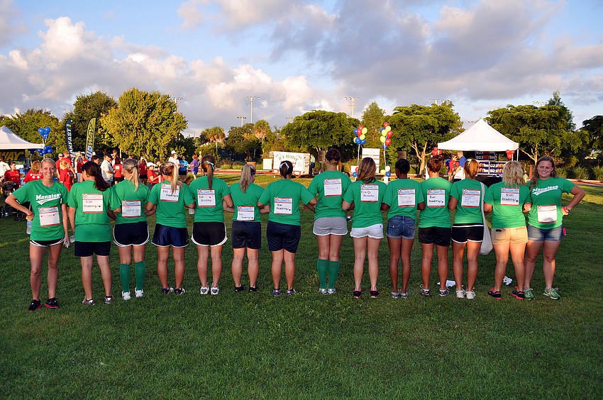 The SCF Manatees softball team walked for their coach, Meredith Headingsâ€™ dad, Ron.