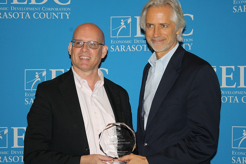 The Creativity and Design Award was presented to architect Jonathan Parks. With Parks is senior designer, Chris Gallgher. The award was presented by Margaret Callihan, Chairman/President/CEO of SunTrust Bank Southwest Florida Region.