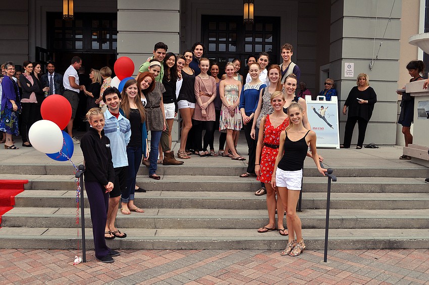 Members of the company that did not go to Washington, D.C. poses on the steps as they wait for the arrival of the other dancers, Monday, Oct. 17 at the FSU Center for the Performing Arts.