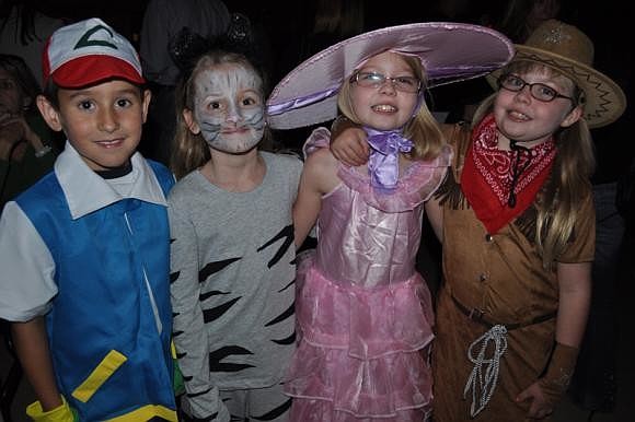 At the McNeal Costume Ball Jack and Brook Knittel caught up with Sophia and Grace Parry.