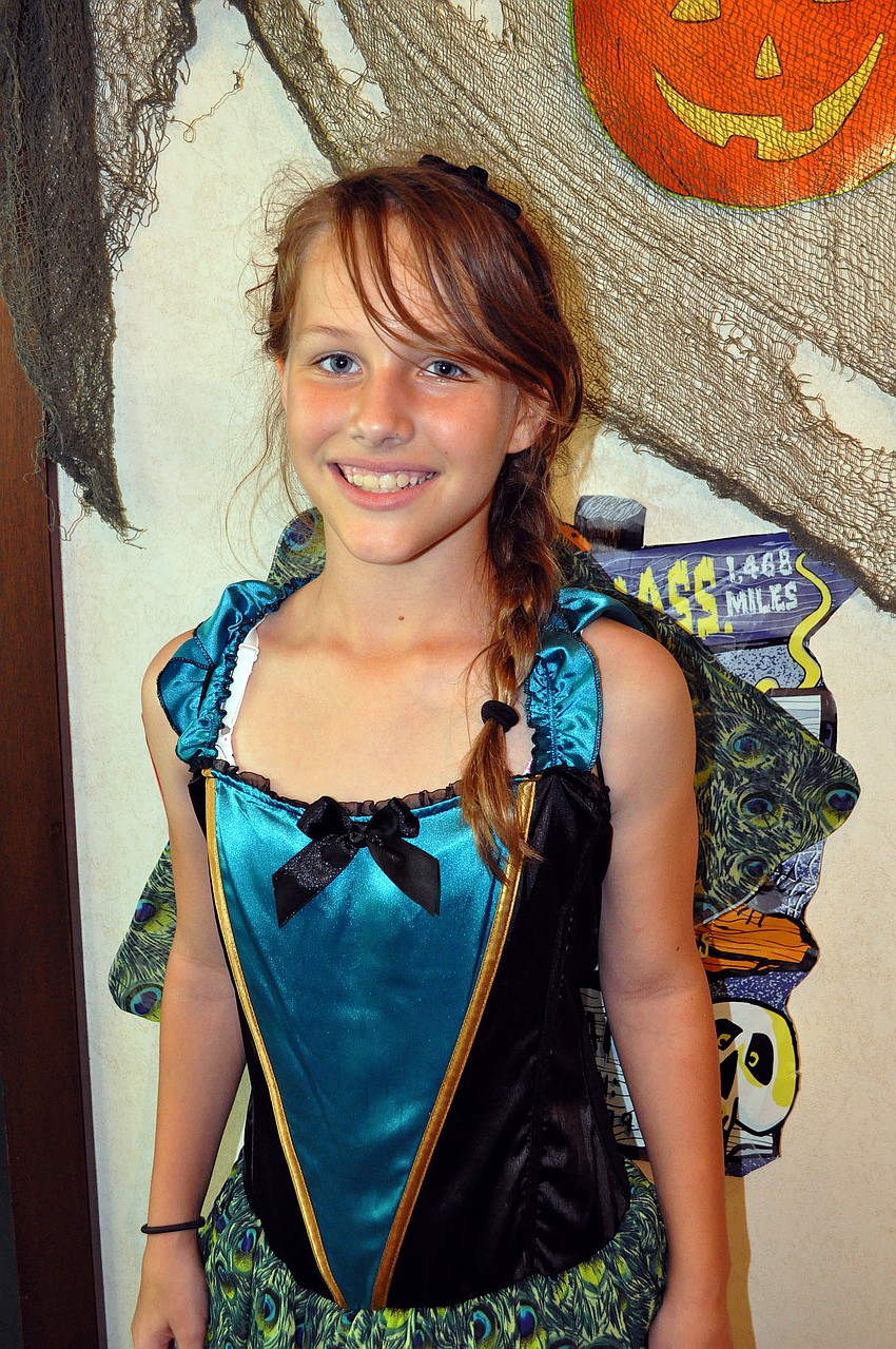 Madison Meyers dressed up as a peacock.