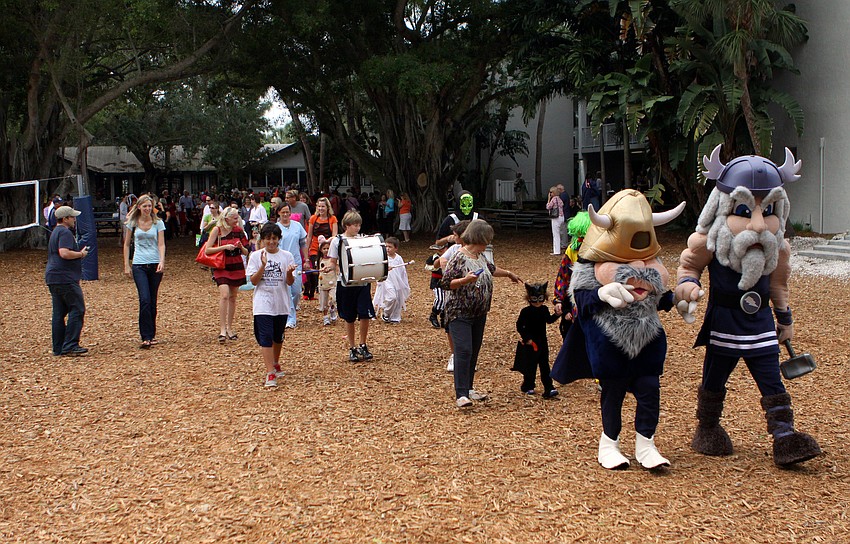 Thor and Mrs. Thor led the costume parade that ended at the brand new Lower School Athletic Pavilion.