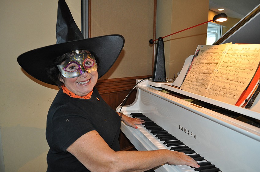 Ann Weber provides entertainment for the evening