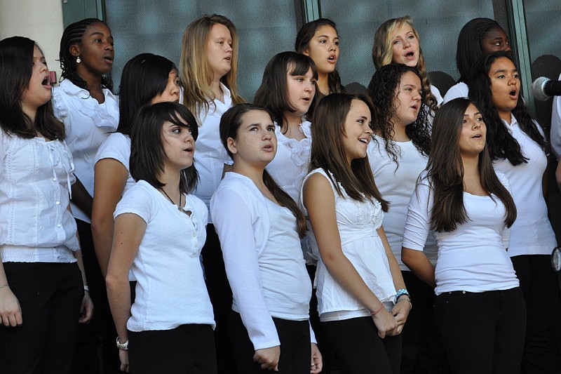 The seventh and eighth-grade combined choir performed a patriotic song.