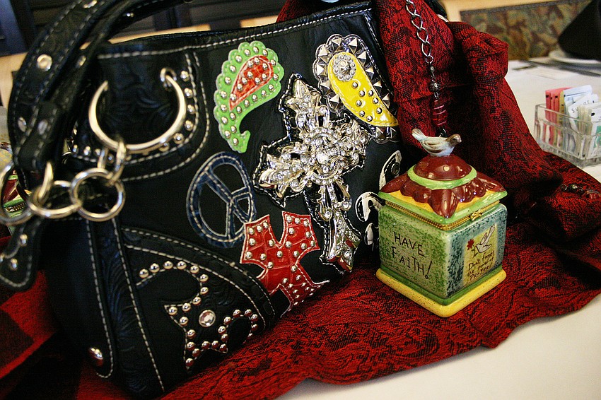 The Rustic Rose provided the purse centerpieces for the luncheon.